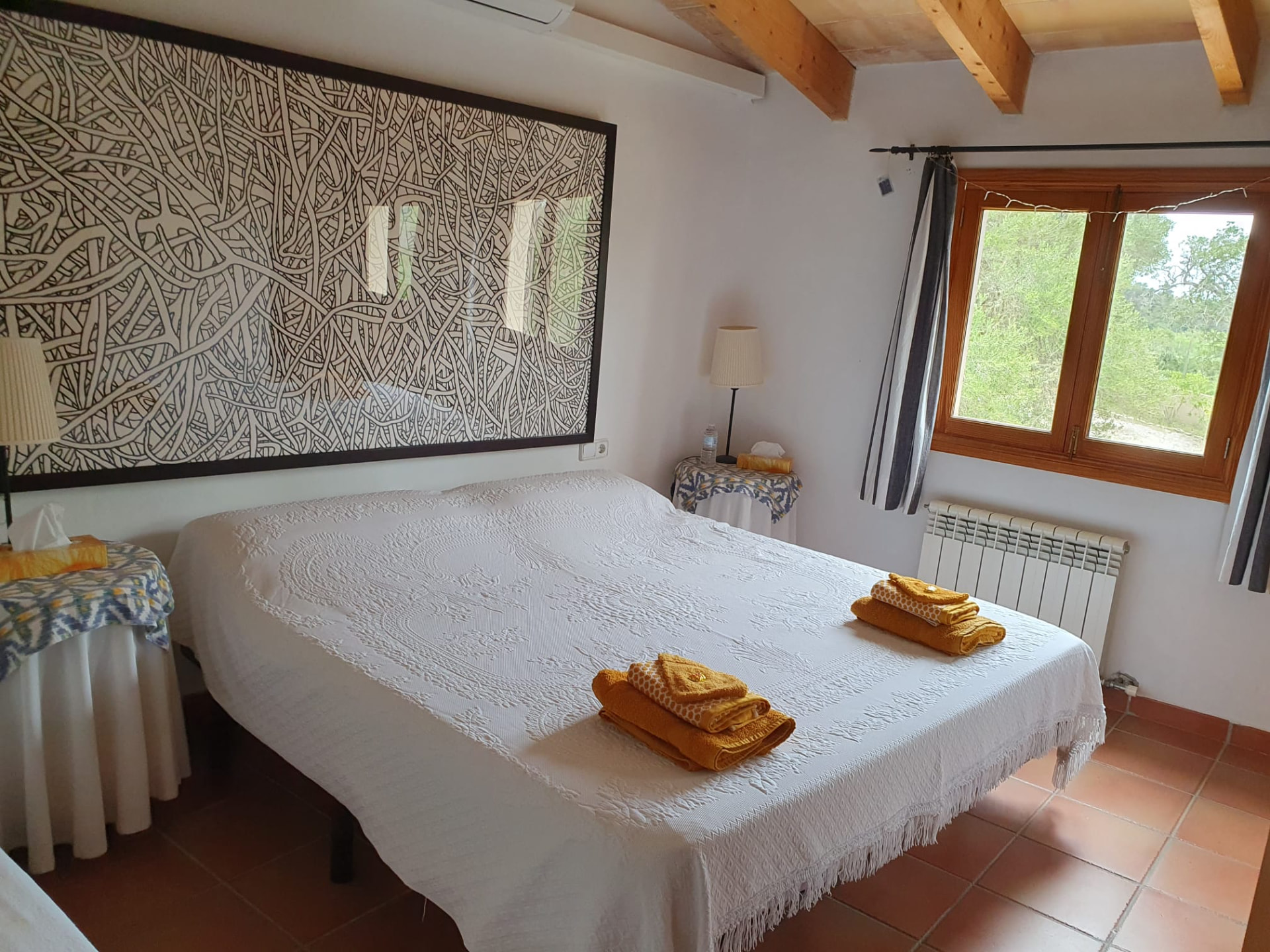 A private bedroom at Casa Romana, prepared for a RAZ Experience guest