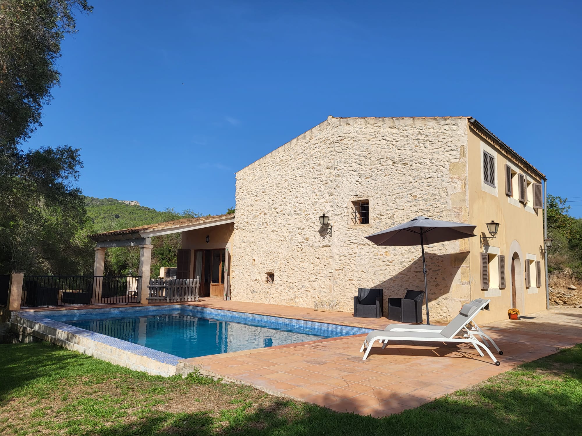 Casa Romana in Es Carritxó — the villa, outdoor swimming pool and garden