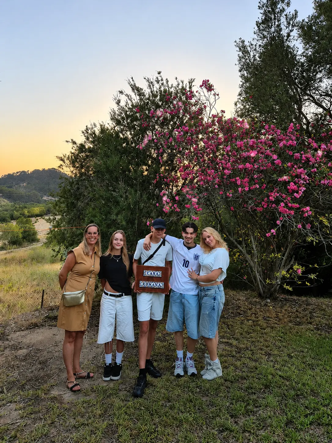 A family together at sunset during a RAZ Family Experience in Mallorca